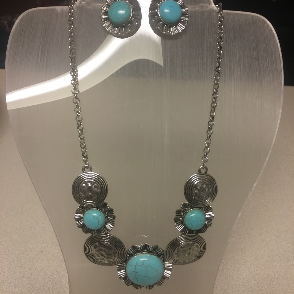 Turquoise and silver necklace.